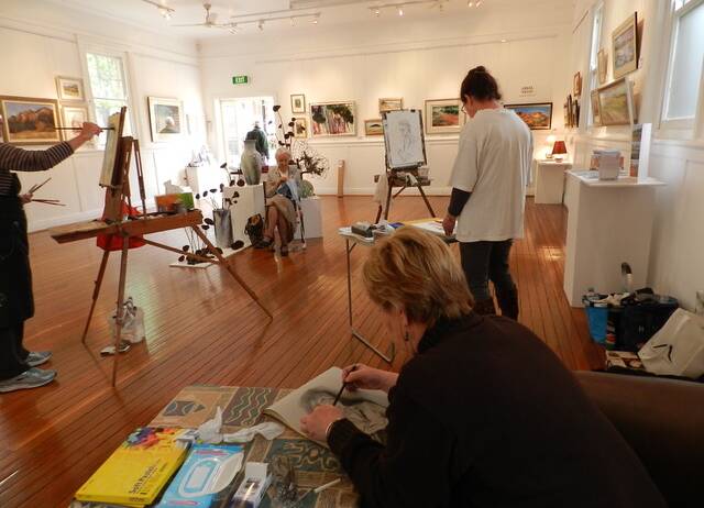 Gloucester Art Society members hard at work creating beautiful pieces in the Gloucester Gallery. Photo supplied