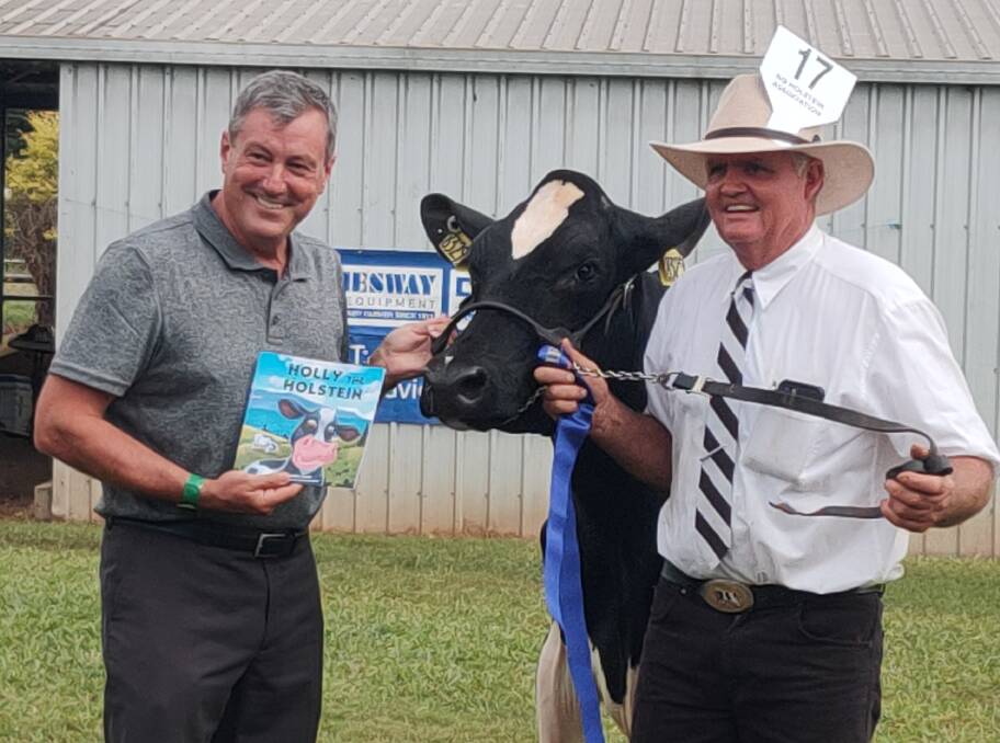 Russel Smith with Colin Daley at the Malanda Show on Saturday June 26 where they raised just over $500 for the Mid Coast dairy farmers. Photo supplied