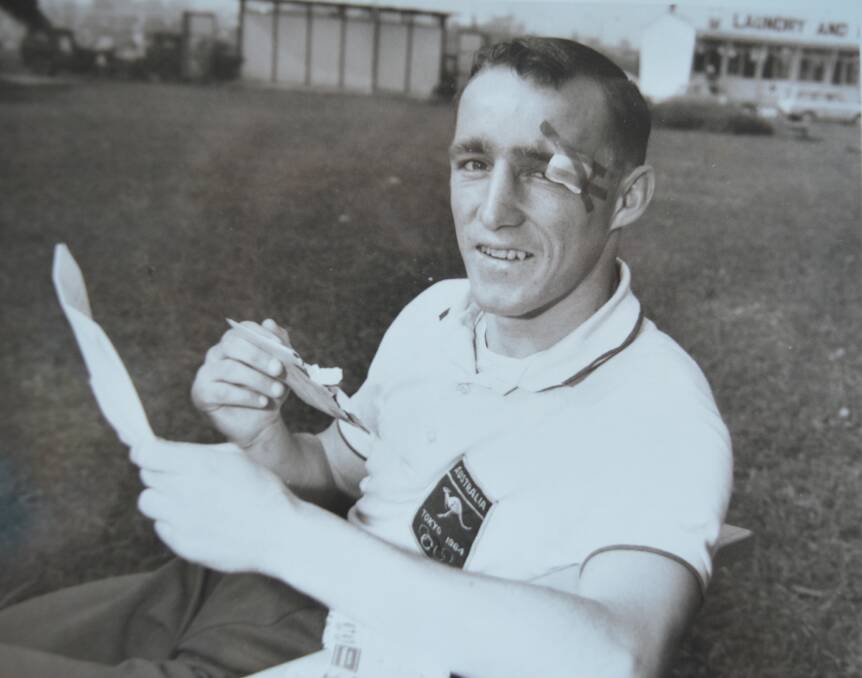 Bill Booth after the fight at the 1964 Toyko Olympics with a bandage over the cut that ended the match. Photo supplied by Bill Booth 