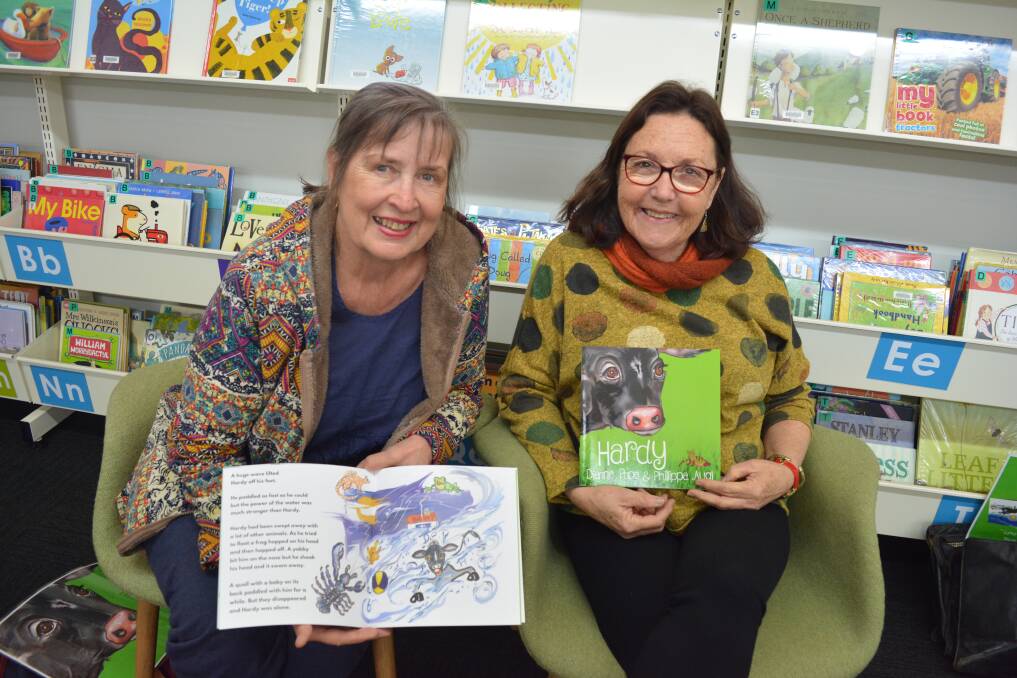 Phillipa Augl and Dianne Pope shared their journey to publishing a picture book about a calf from Stroud during a visit to Gloucester Library storytime.