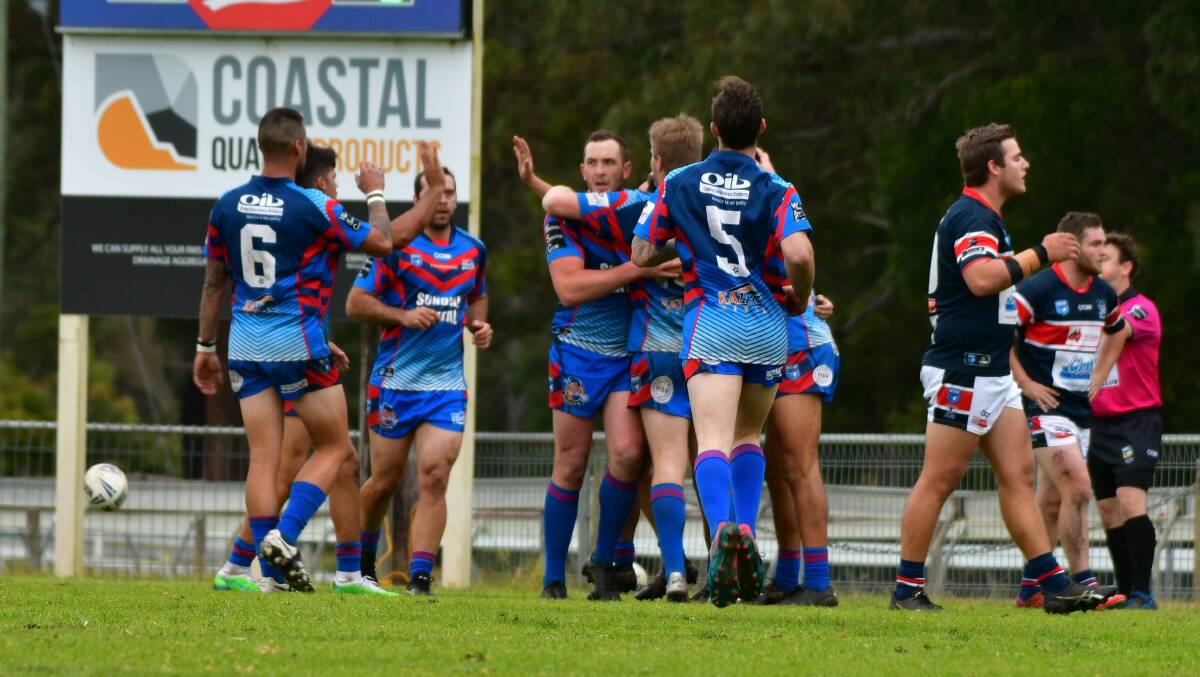 Another win: Wauchope celebrate Mat Bird's first-half try.