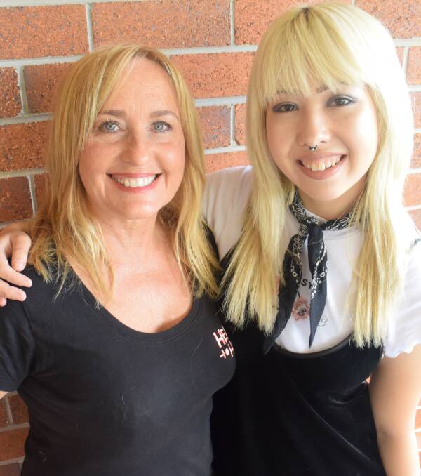 Learning together: Heart To Heart founder Donna Rankin and Macquarie University student Monica Cusack. Monica is developing data on Heart To Heart. 