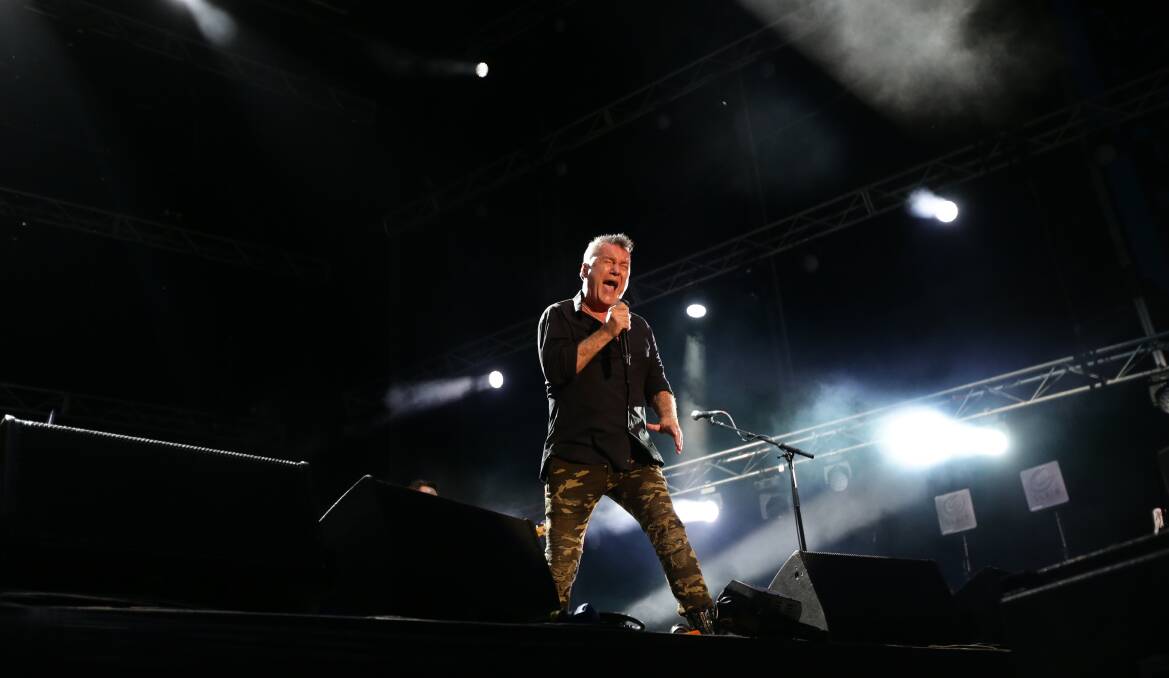 ON FIRE: Jimmy Barnes belting out the hits during Cold Chisel's Newcastle Supercars show. Picture: Jonathan Carroll