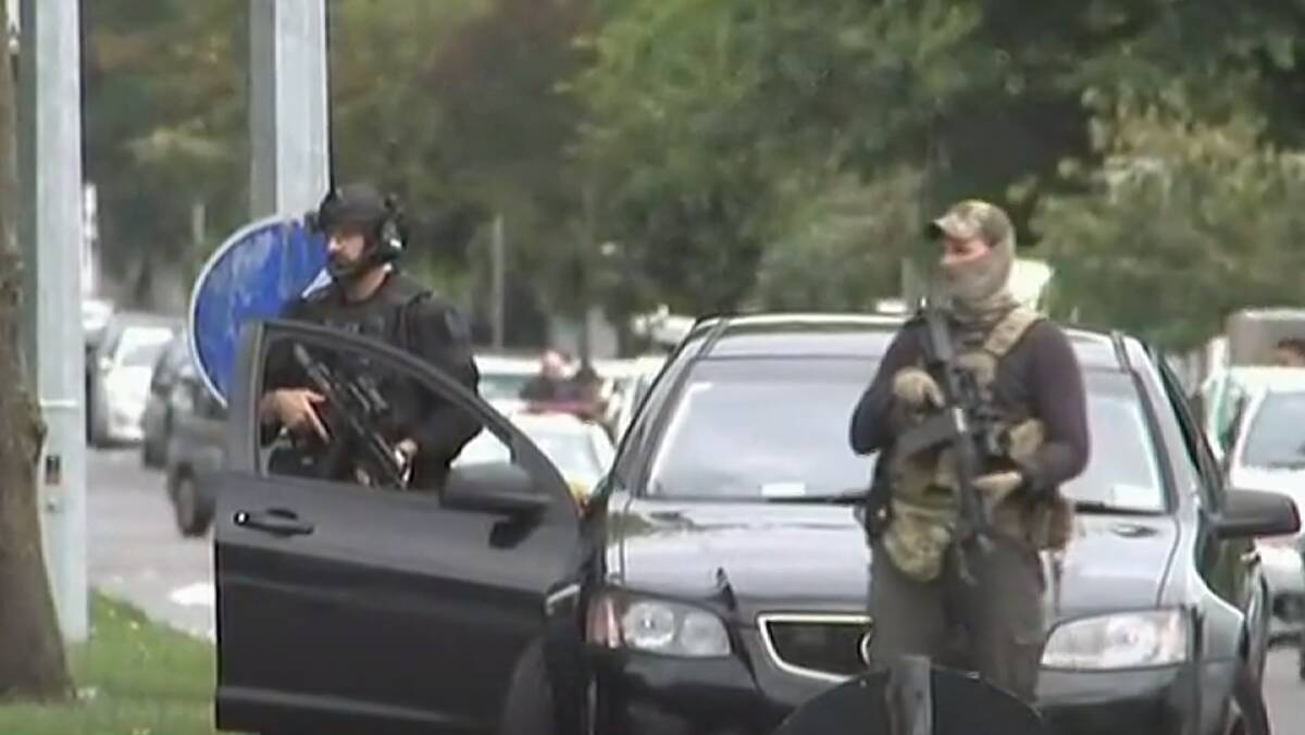 Armed police on Christchurch streets. Photo: Screen grab from ABC 24 News