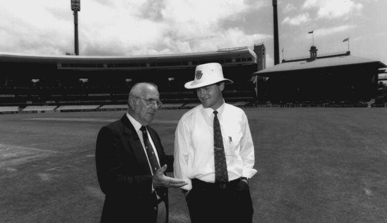 Former umpire, Ted Wykes with umpire Simon Taufel, 23, pictured at the Sydney Cricket Ground in 1994. Photo by Peter Rae, Fairfax Media