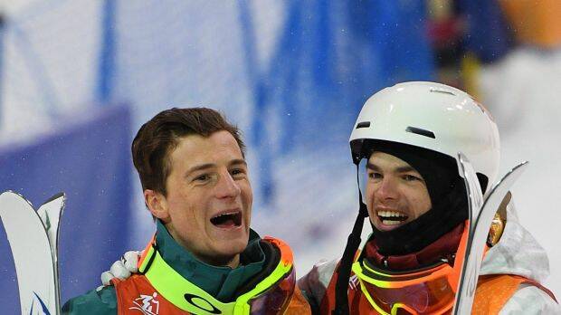 Matt Graham of Australia and Mikael Kingsbury of Canada celebrate after winning the silver and gold respectively. Photo: AAP