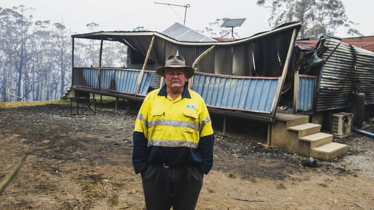 Lindsay Lavis stands in front of his house at Tianjara on the NSW South Coast. Photo: Dion Georgopoulos. 