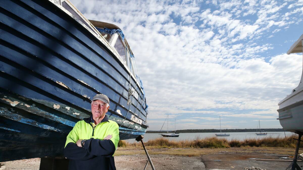 High and dry: Oyster Cove marina operator Robert Bailey said future growth of the Port Stephens waterway was dependent on the channel being dredged. Picture: Dean Osland