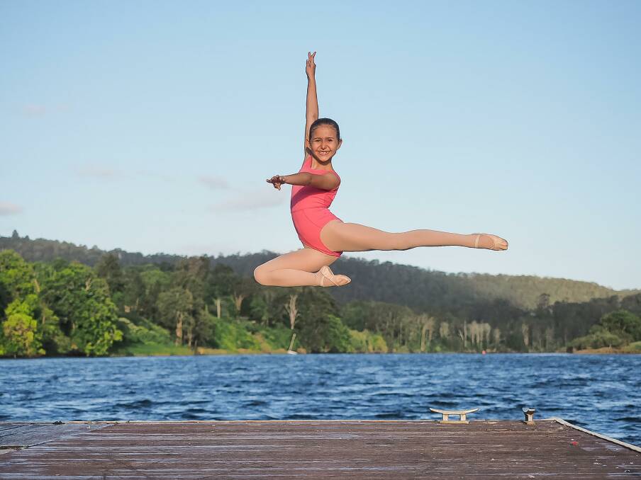 Dedicated: Nine-year-old Ava Gilbert showcasing her dancing skills by the Manning River at Wingham Riverside Reserve.