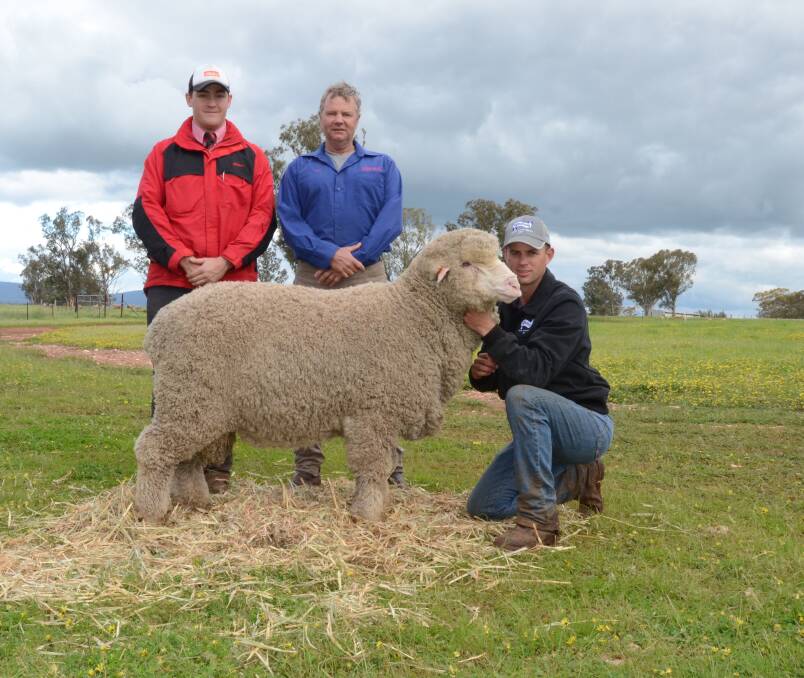 BETTER TIMES: Blake Tremain-Cannon, right, with a prized ram from his family's Peak Hill property. The farm was one of four properties involved in a Supreme Court dispute between Mr Tremain-Cannon and his mother Leanne Tremain. 