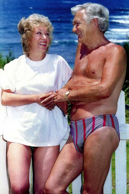 Casual: The memorable photo of couple Blanche d'Alpuget and Bob Hawke taken by Illawarra Mercury photographer Orlando Chiodo on the South Coast on New Year's Eve in 1994.