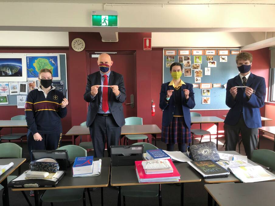 Damascus College and Ballarat's Catholic secondary schools started wearing masks in class on Monday, a week before they become mandatory in regional areas.