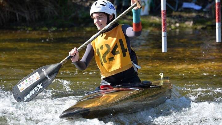 Sophia Sweeney flying down the river in the C1 Slalom event.