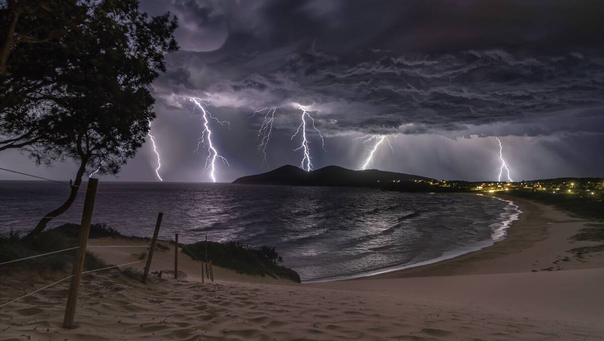 The storm from the sand dune at One Mile Beach. Photo: Raw Edge Photography/Kian Bates.