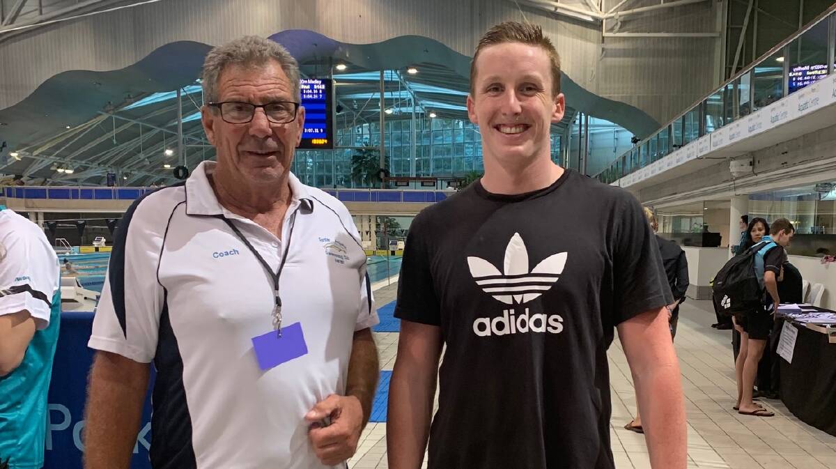 Nash with Forster Aquatic Swim Club coach Peter Sanders.