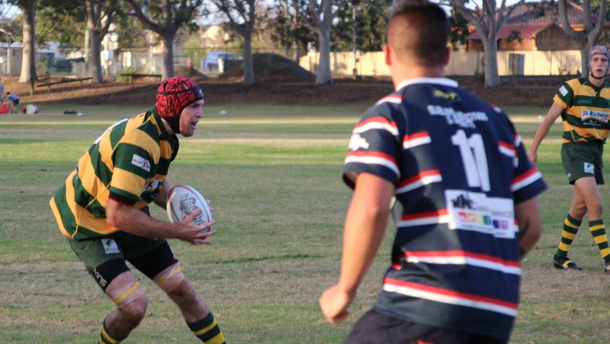 Sean Hassett drives the ball up against the Wauchope Thunder on Saturday. Photo by Sue Hobbs.