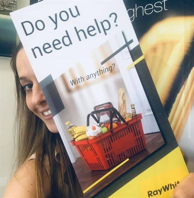 Ray White Forster-Tuncurry business development manager, Katrina OSullivan, handing out flyers to the community.