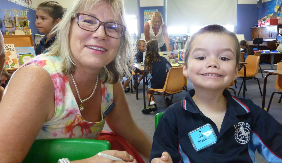 Jax Blacker with relieving assistant principal Penny Holm on his first day at Forster Public School.