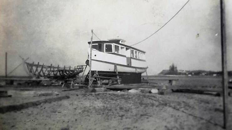 The ketch Yola (left) being built next to the Alma G at Wrights wharf, Tuncurry in 1946.