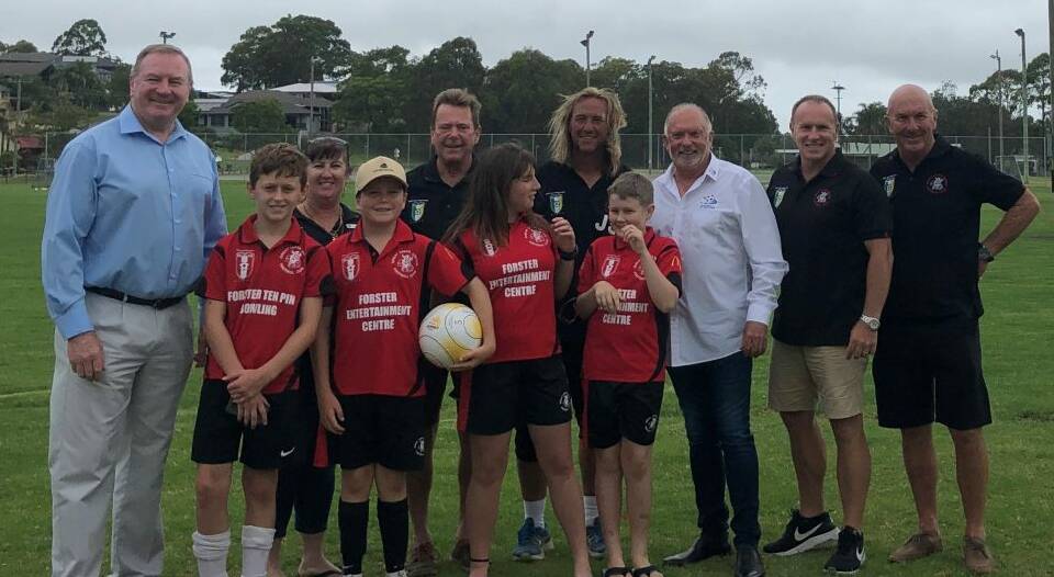 Member for Myall Lakes, Stephen Bromhead, with members of the Great Lakes United Football Club. Photo supplied.
