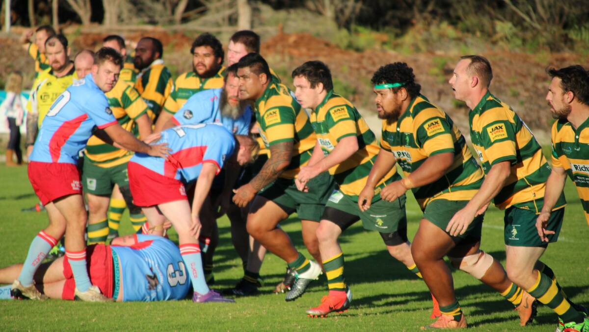 The kind of defence that has seen the Forster Tuncurry Dolphins remain unbeaten throughout the 2019 rugby season. Photo by Sue Hobbs.