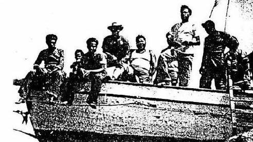 Aboriginal workers aboard the Yola at Lockhart River Mission in 1956.