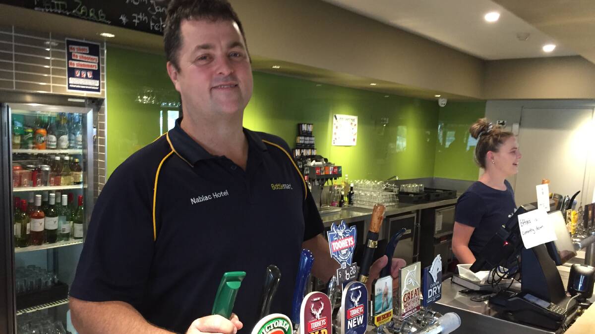 Nabiac Hotel publican Matt Morris is happy to be back in business today after being forced to close during yesterday's fire scare.