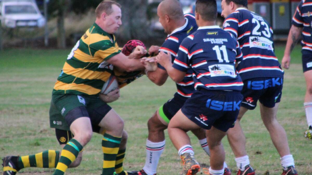 Players from Forster Tuncurry and Wauchope come together in Saturday's clash at Wauchope. Photo by Sue Hobbs.