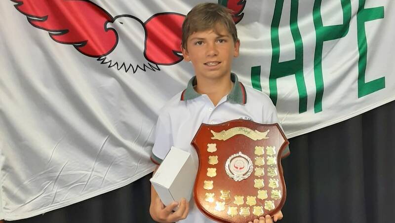 Camden Ceccato receiving his Junior Patron's Award at Cape Hawke Surf Life Saving Club. 