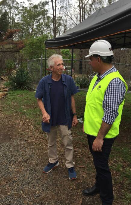 Deputy premier John Barilaro talks with Peter Hassell, who lost his home in the Hillville fire.