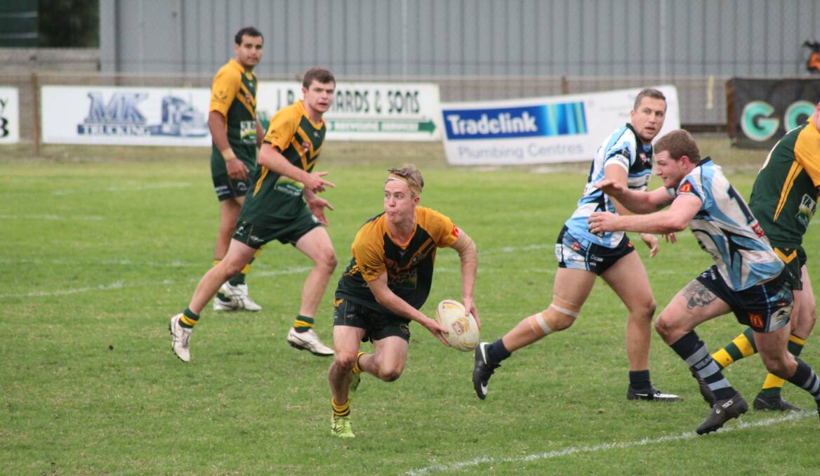 Forster Tuncurry Hawks' hooker Riley Glover looks to offload in the Hawks 22-16 win over Port City.