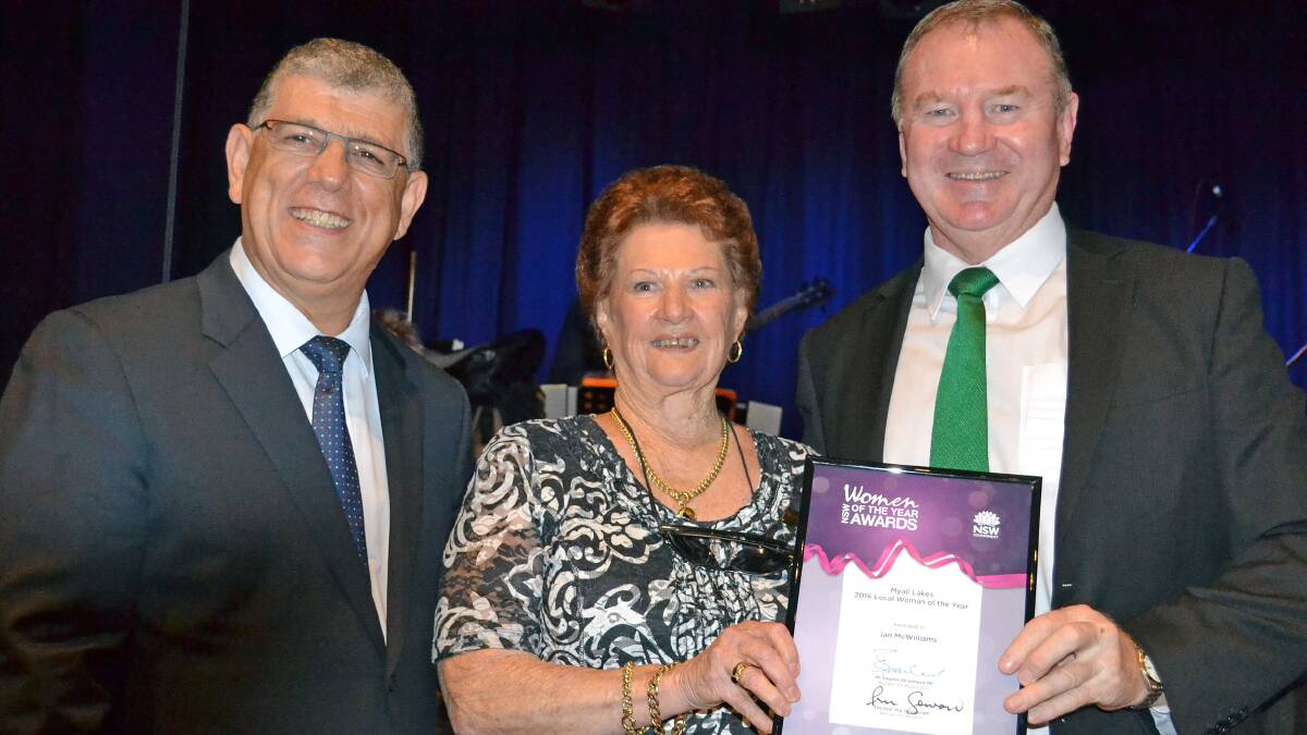 Councillor Jan McWilliams receiving an award off member for the Myall Lakes, Stephen Bromhead.