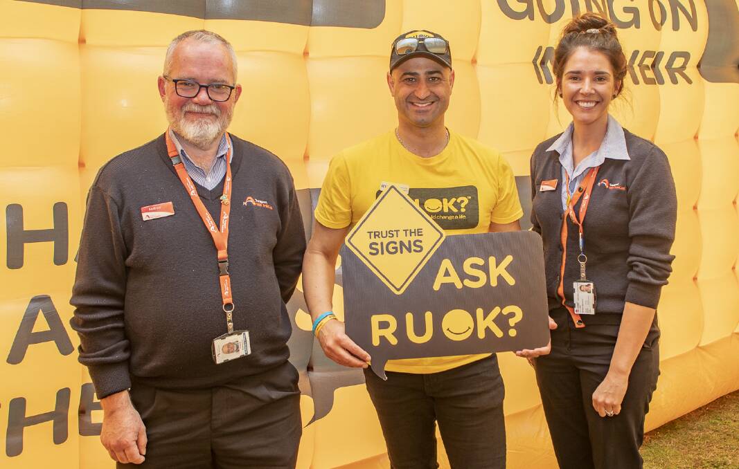 Mostapha Kourouche (centre) says R U OK? Day is a call to action for everyone. Photo courtesy of Ben Houston.