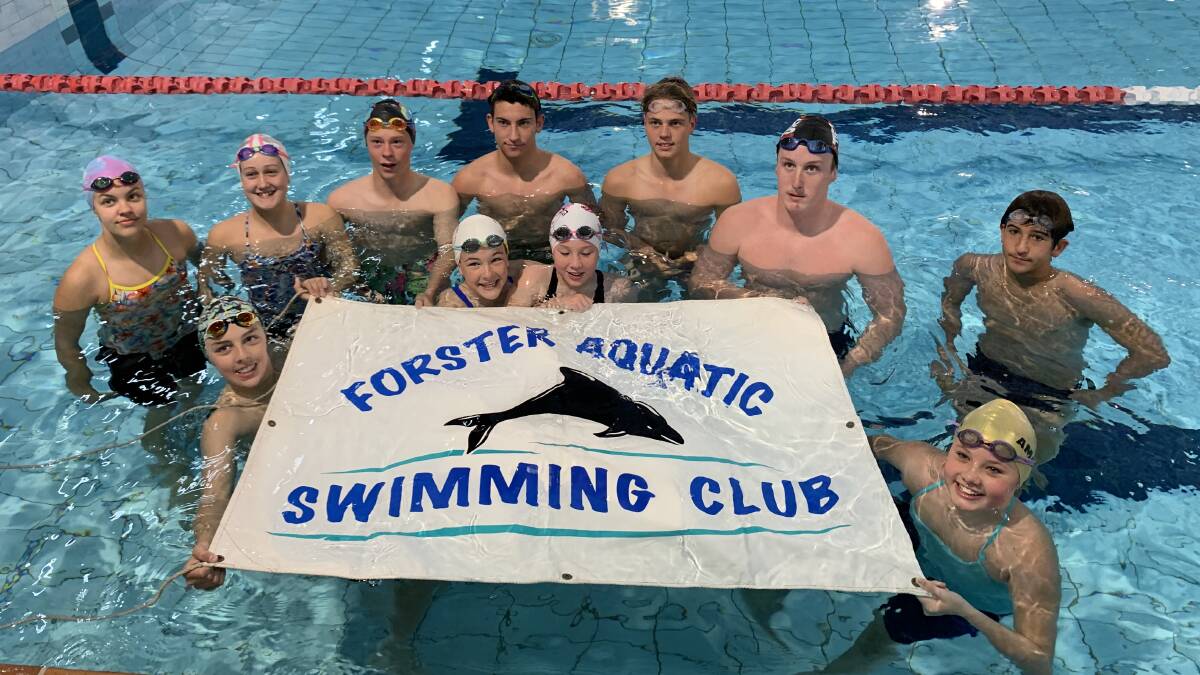 Members of the Forster Aquatic Swim Club are happy to be back in the pool and powering. Photo supplied.