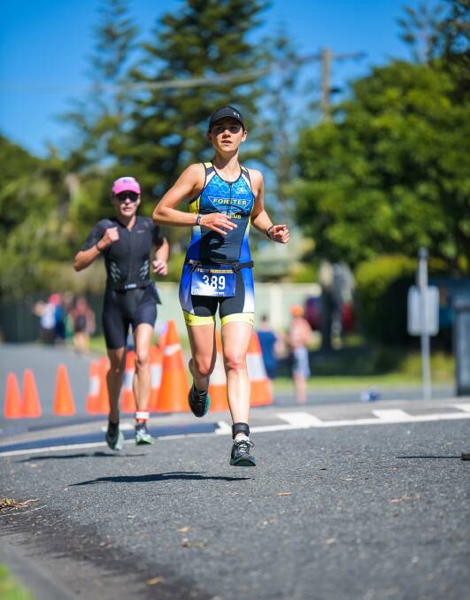 Margaret Gordon helps Forster Tri Club to a win in division three at the Triathlon NSW Club Championships. Photo: Liam Worth Photographer.