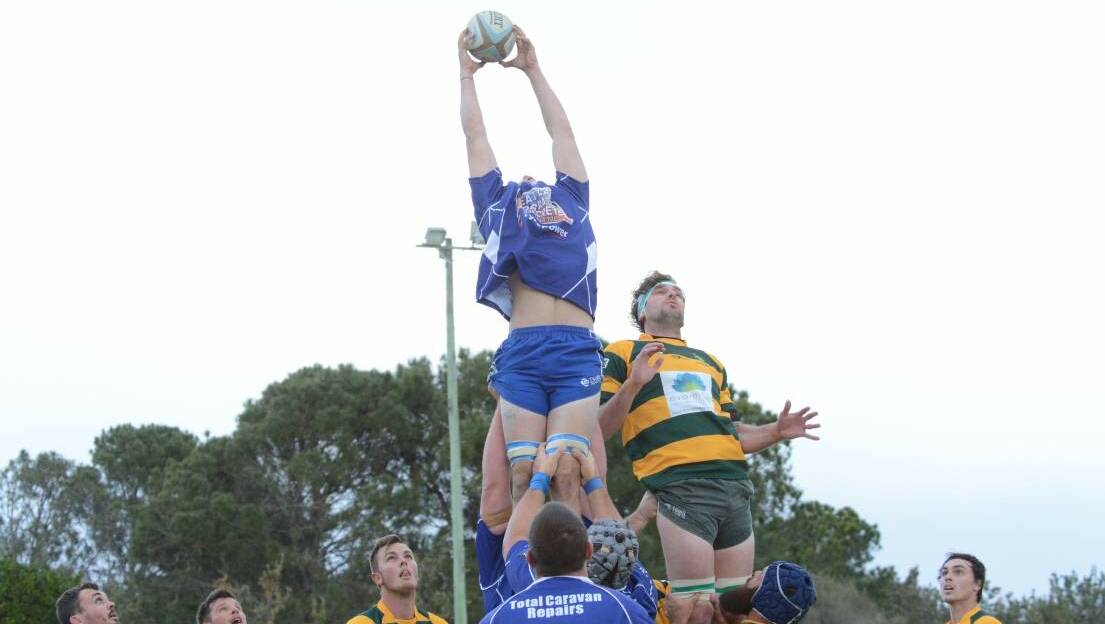 Wallamba Bulls' flanker Rhys Hessing soaring above the opposition in healthier times.