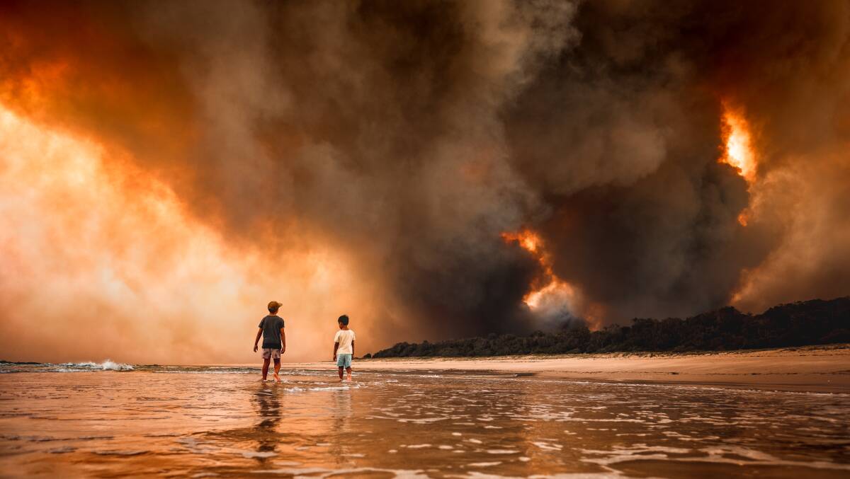 Says Martin Von Stoll of this image, "I see terror, I see nature. I also had the thought of my sons standing there, standing their ground, going to the fire, Go away, this is our beach."
