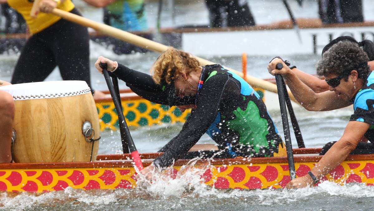 Wendy Orman (front) paddling hard in a recent race.