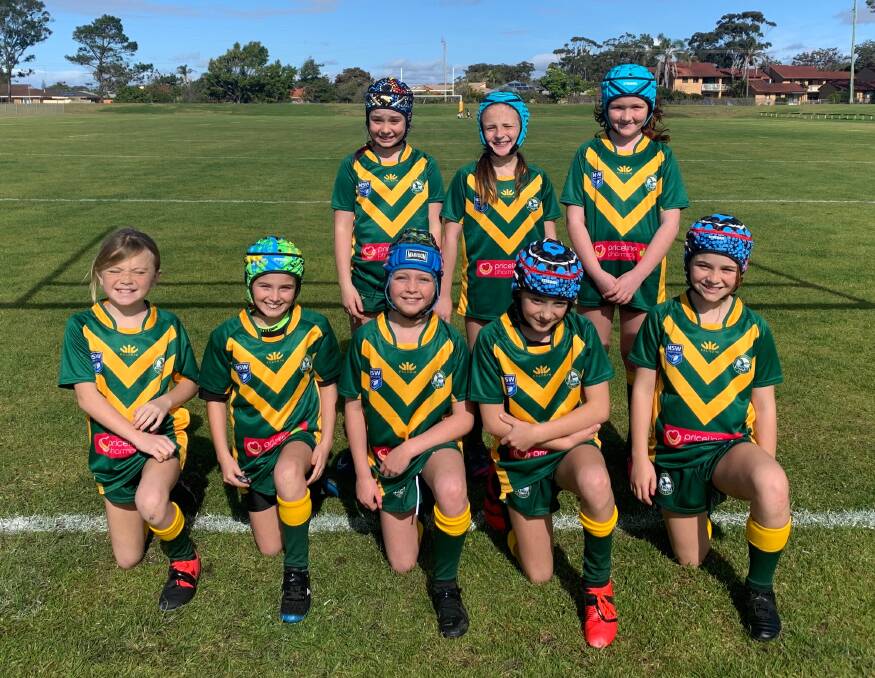 A Groundbreaking Day: (back) Eloise Adams, Piper Mandham, Luca Manning, (front)
Milla Kidd, Elia Jenkins, Alexis Wakefield, Gracie May Pollock-Digges and Ruby Dodds make history for the Hawks as the first all-girls team to play in the boys competition.
