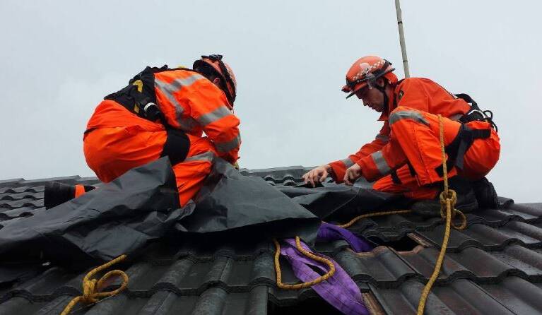 SES units across the Mid Coast were forced to patch a number of leaking roofs in the heavy rain. Photo: portnews.com.au