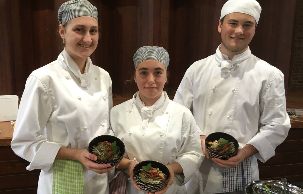 Heidi Buchanan, Tahlia Mancini and Flynn Weiley with their winning dishes at the Tocal Bake or Burn.