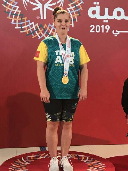 Teila Bulmer on the winner's podium at the World Special Olympic Games.