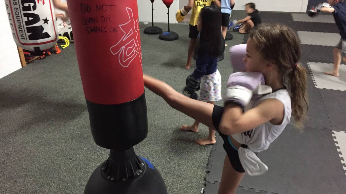 Eight-year-old Grace Zarate shows off the impressive self-defence skills she's already picked up.