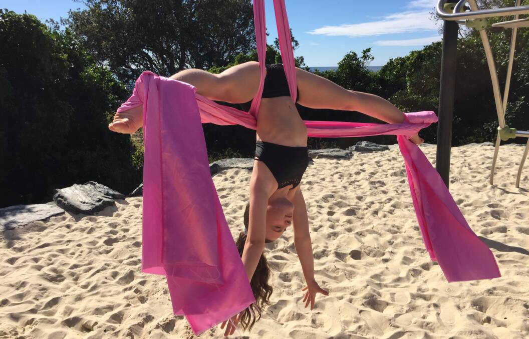 Ten-year-old Keeva Sheridan showing off some of the skills she's taught herself in aerial silk.