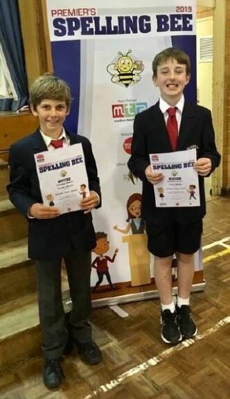 Maxim Ceccato, pictured with fellow Forster Public School student Lucas Guiney, after winning the Premier's Spelling Bee regional finals.