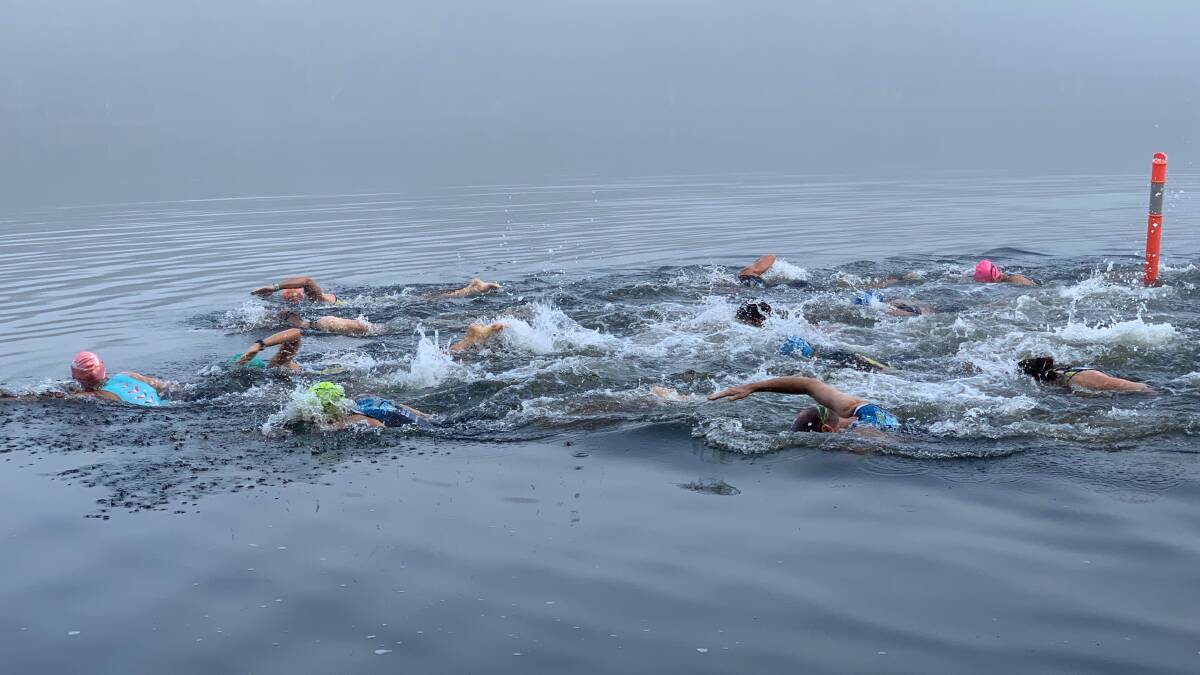 Competitors get started in the eerie fog.