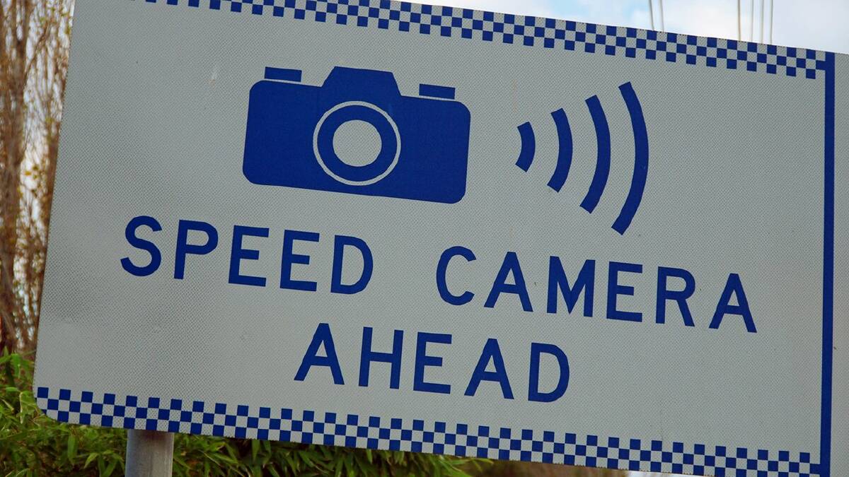 Should signs warning of upcoming speed cameras be removed? Photo supplied.
