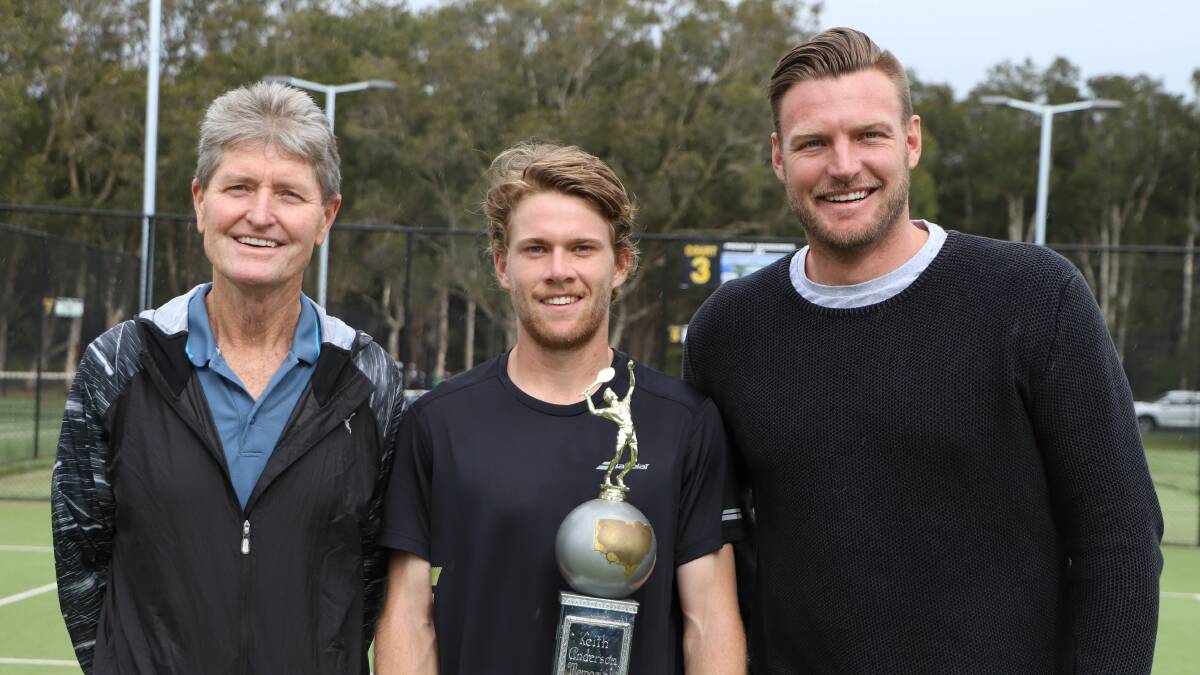 Forster's Brenton Chambers took out the AMT men's competition at the country championships. Here he is presented with his trophy by Tennis NSW president Kim Warwick and former professional Sam Groth.