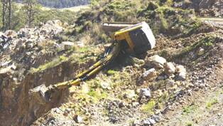 Crushed: The excavator in which Ryan Messenger died at the Hunter Quarries site at Karuah.