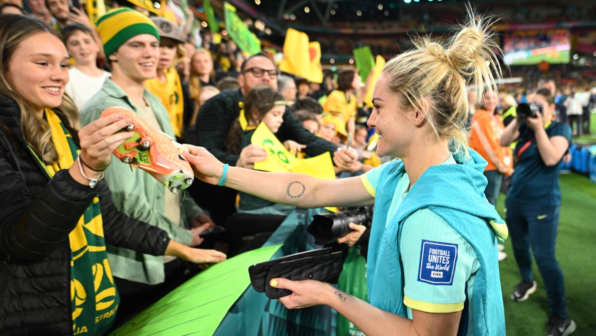 Ellie Carpenter gives a boot to a fan after the Matildas' inspiring run at this year's World Cup. Picture Getty Images